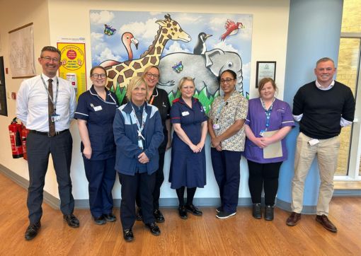 Phil with staff from the Children's Ward and ISS