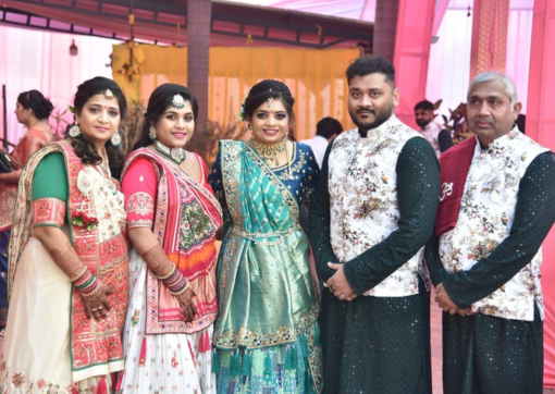 Mamta and her son and daughter in traditional wedding dress