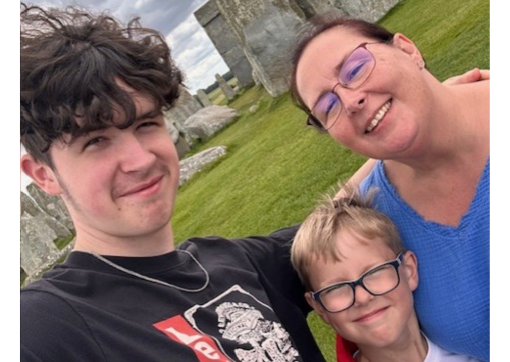 Sharon pictured with her two sons in front of Stonehenge