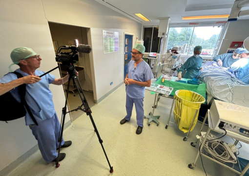 Sky News reporter, Ashish Joshi, talking about our work in a theatre at HRI as a surgical procedure takes place