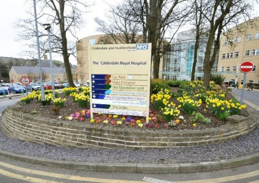 The turning circle is a small roundabout with flowers on it 